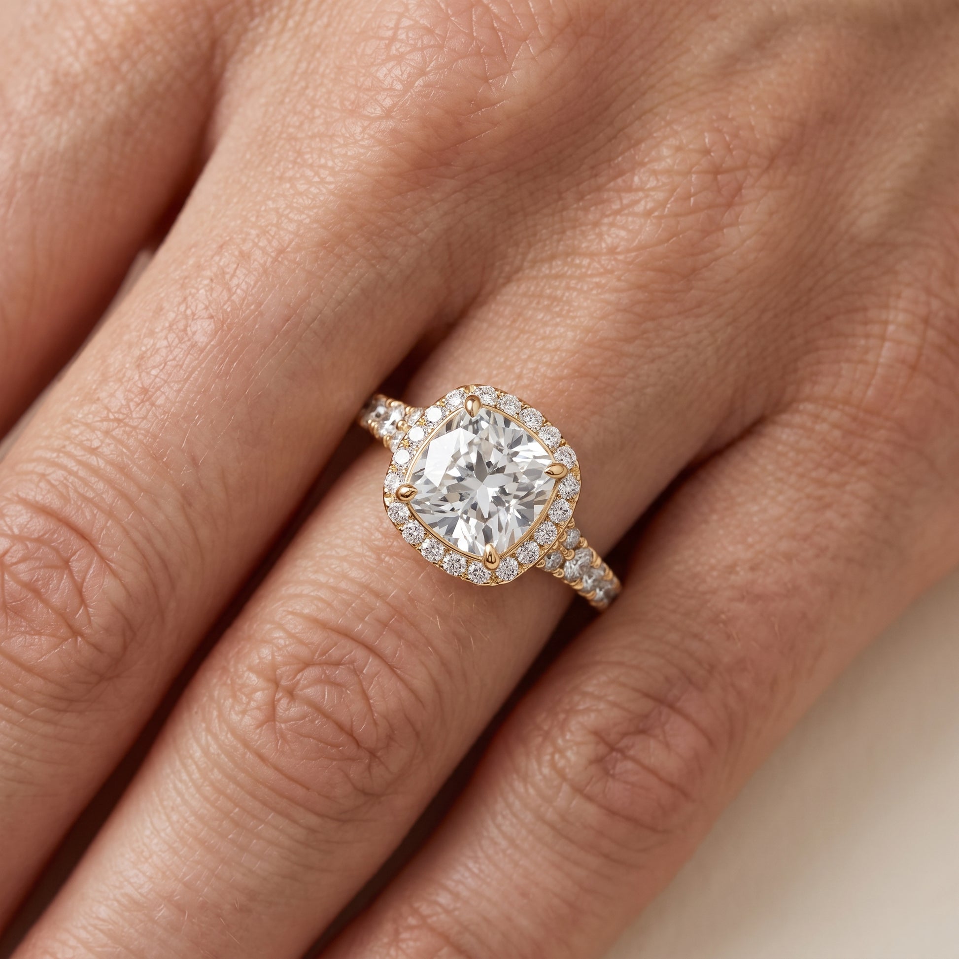 Bella Halo Pavé Cushion Diamond Engagement Ring in Yellow Gold - lifestyle.jpg