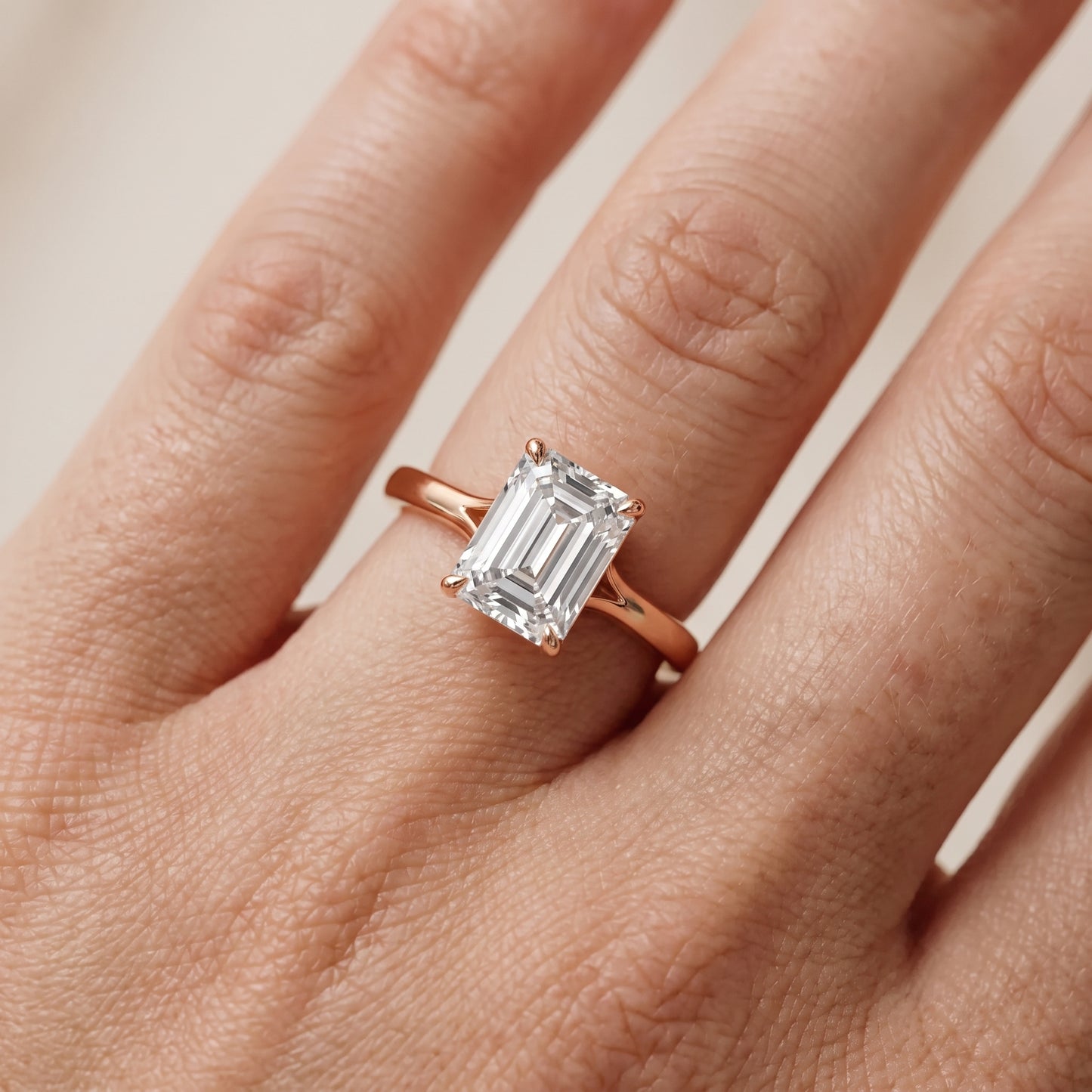 Anais Trellis Solitaire Emerald Diamond Engagement Ring in Rose Gold - lifestyle.jpg
