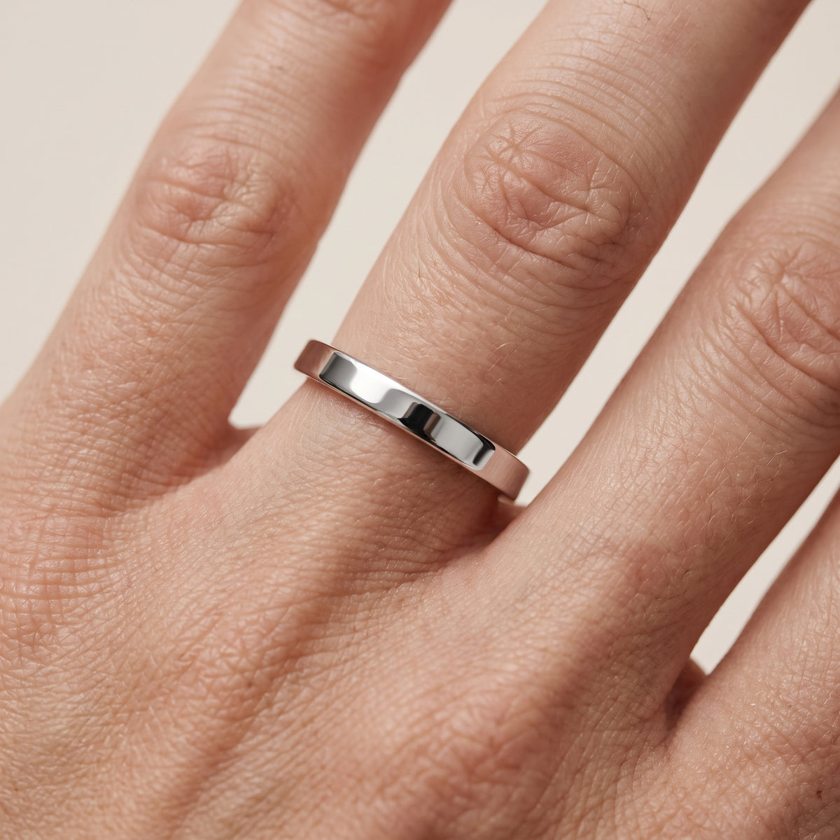 Wren Classic Flat Wedding Band in Platinum - lifestyle.jpg