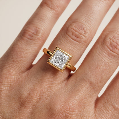 Alina Bezel Solitaire Princess Diamond Ring in Yellow Gold - lifestyle.jpg