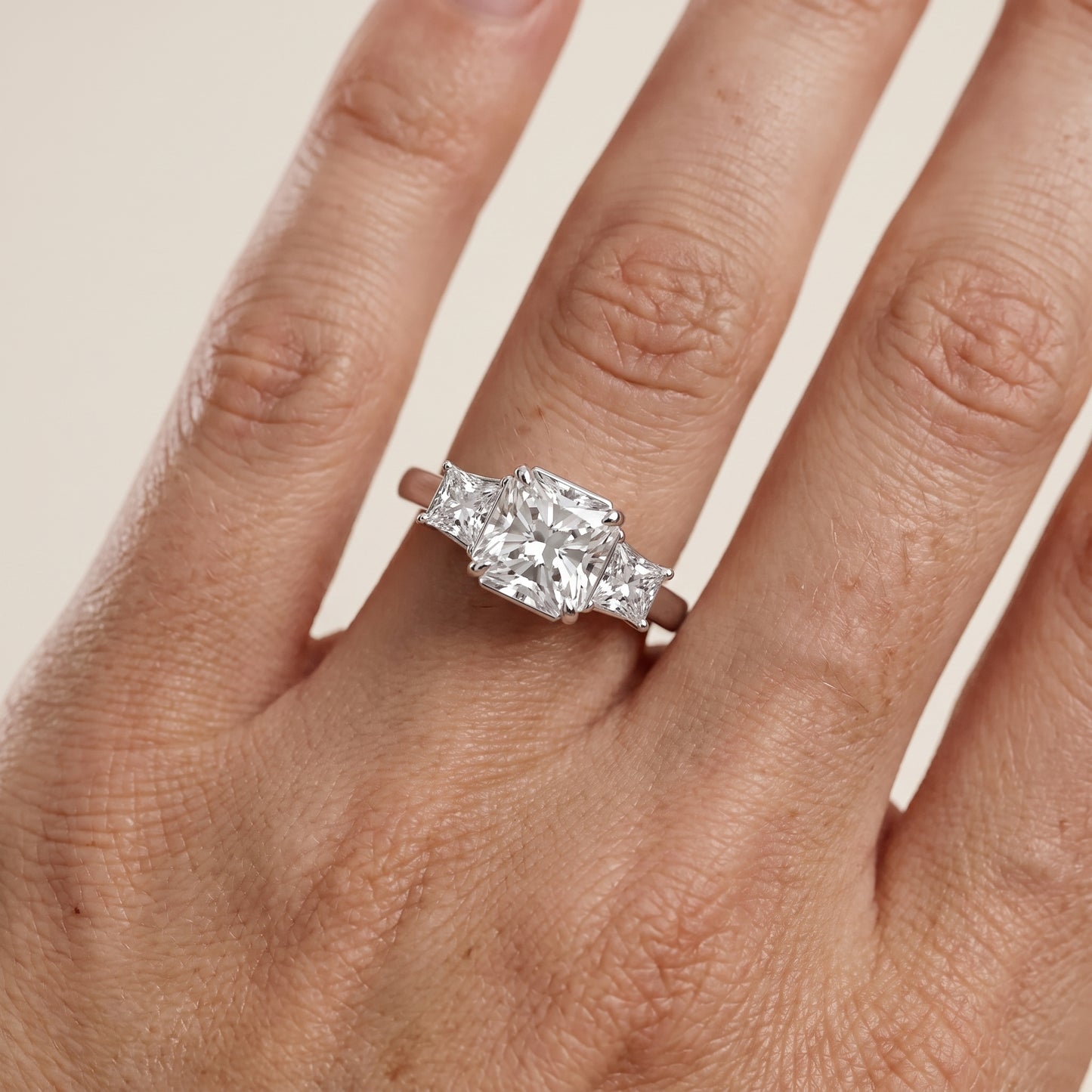 Selena Three-Stone Basket Radiant Diamond Ring in Platinum - lifestyle.jpg