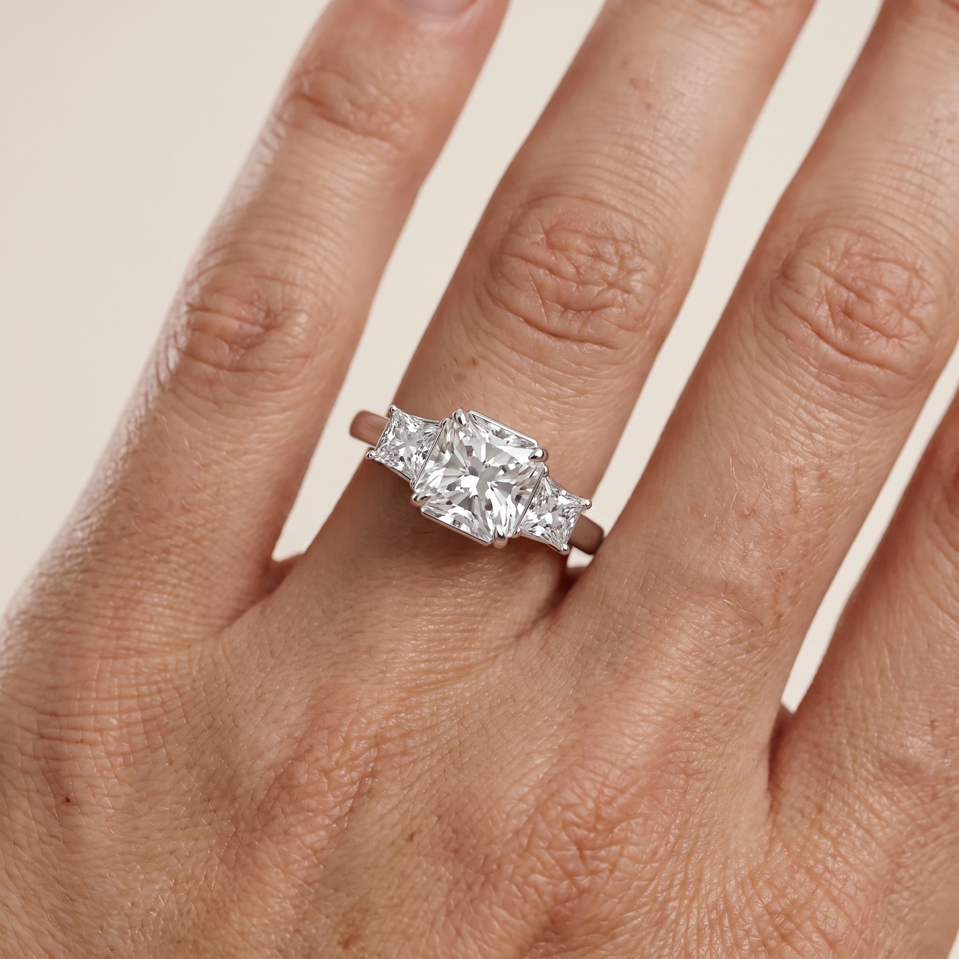 Selena Three-Stone Basket Radiant Diamond Ring in Platinum - lifestyle.jpg