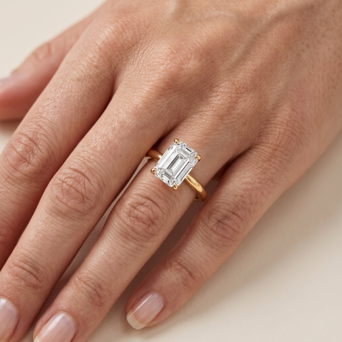 Clementine Solitaire Emerald Diamond Engagement Ring in Silver - lifestyle.jpg