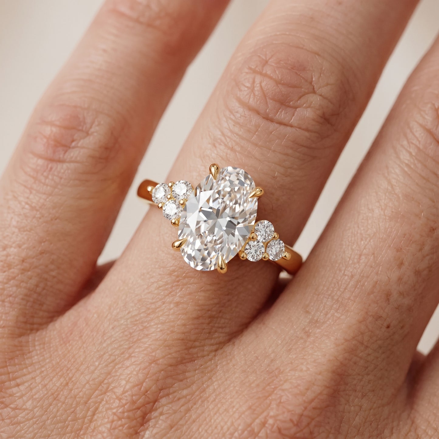Anya Sidestone Cluster Oval Diamond Ring in Yellow Gold - lifestyle.jpg