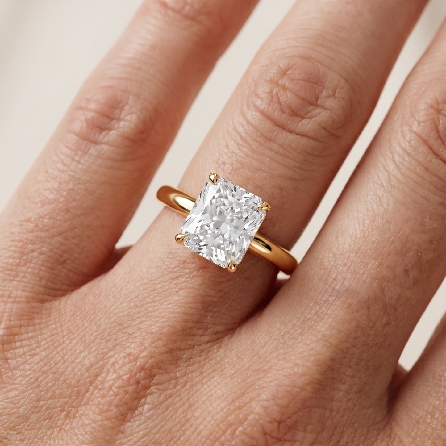 Sadie Cathedral Solitaire Radiant Diamond Ring in Yellow Gold - lifestyle.jpg