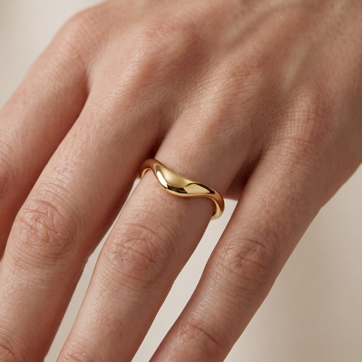 Gwendolyn Curved Contour Wedding Band in Yellow Gold - lifestyle.jpg