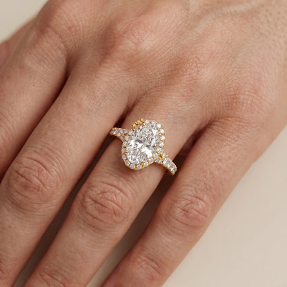 Bella Halo Pavé Oval Diamond Engagement Ring in Yellow Gold - lifestyle.jpg