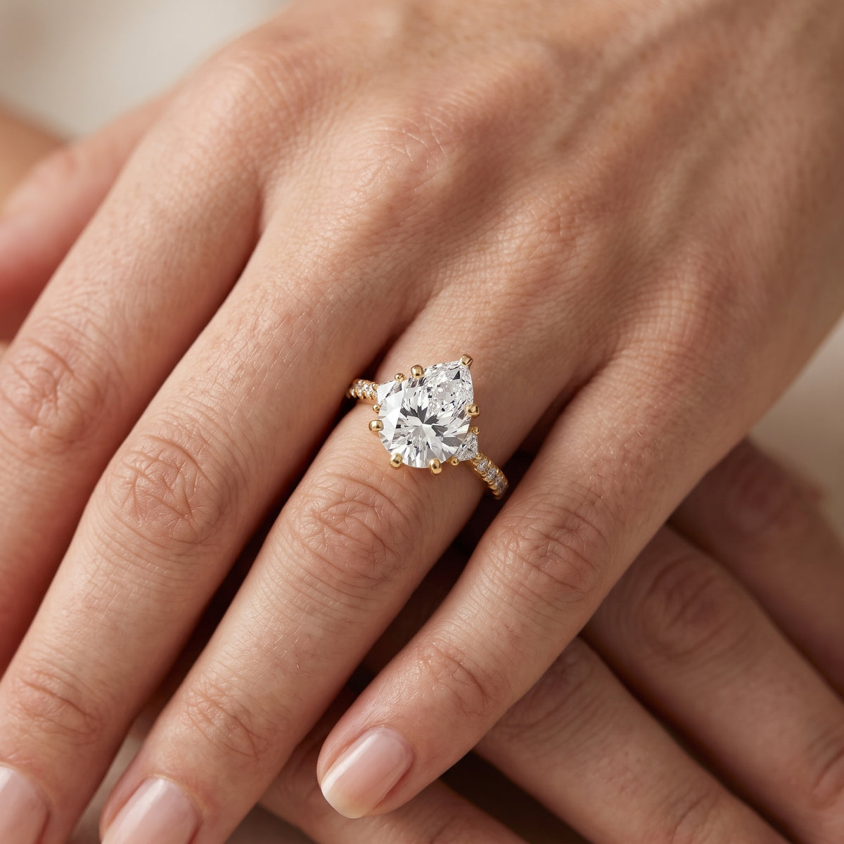 Alethea Three-Stone Pavé Pear Diamond Engagement Ring in Silver - lifestyle.jpg