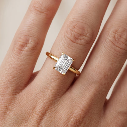 Amira Six-Prong Solitaire Emerald Diamond Engagement Ring in Yellow Gold - lifestyle.jpg