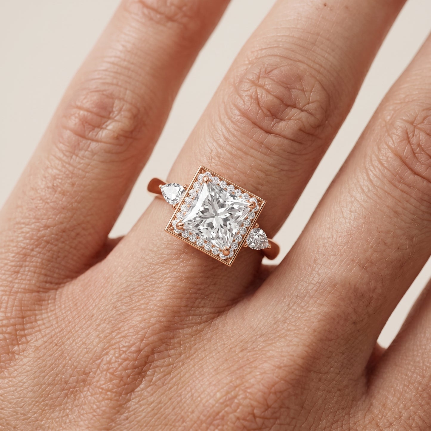 Eliza Halo Sidestone Princess Diamond Engagement Ring in Rose Gold - lifestyle.jpg