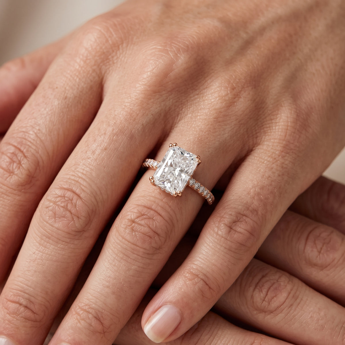 Celeste Hidden Halo Pavé Radiant Diamond Engagement Ring in Rose Gold - lifestyle.jpg