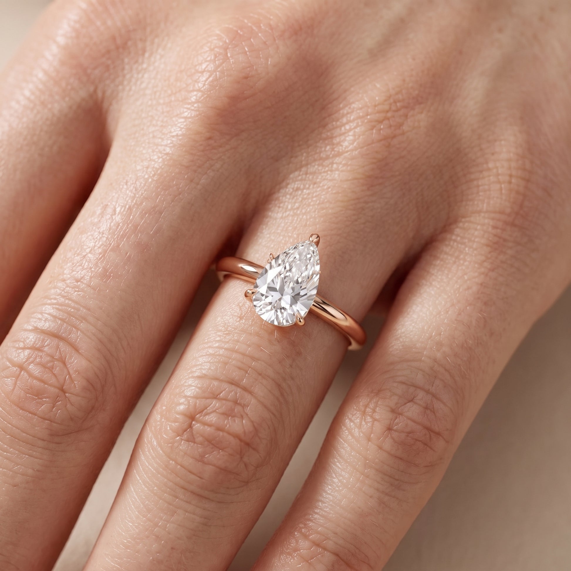 Amaya Hidden Halo Pear Diamond Ring in Rose Gold - lifestyle.jpg