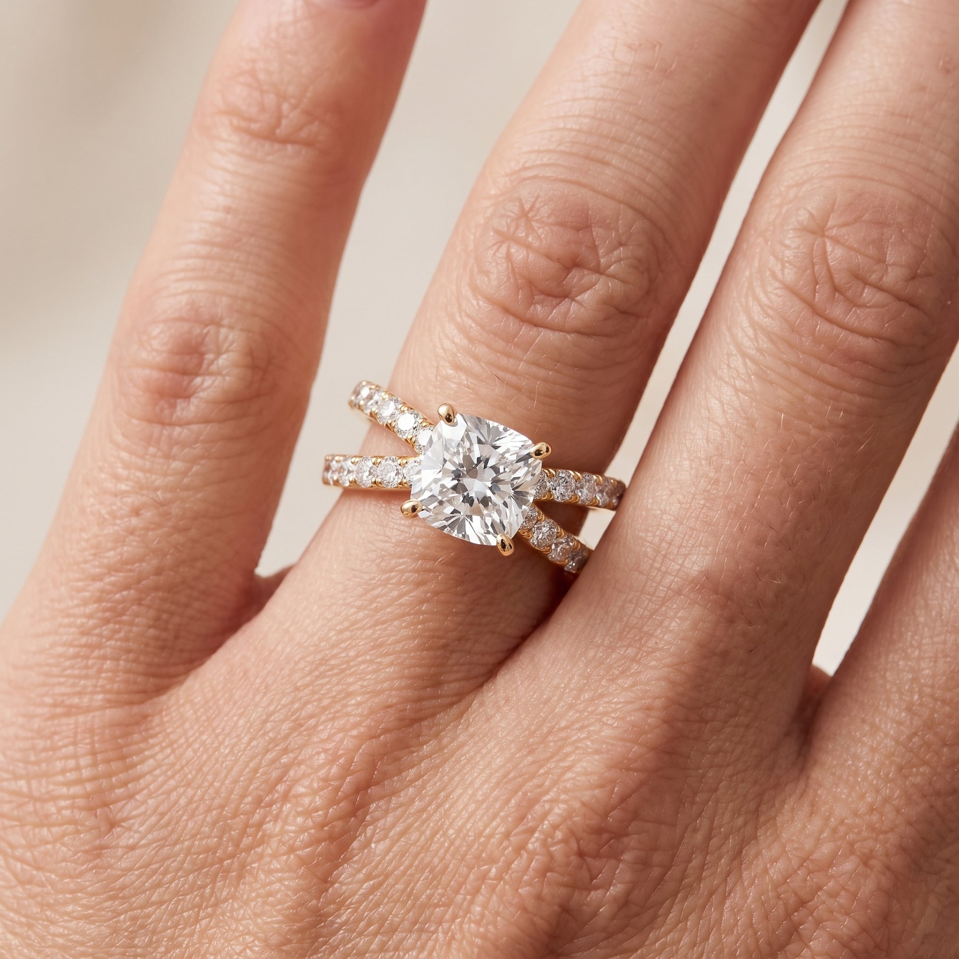 Lior Criss Cross Pavé Cushion Diamond Engagement Ring in Yellow Gold - lifestyle.jpg