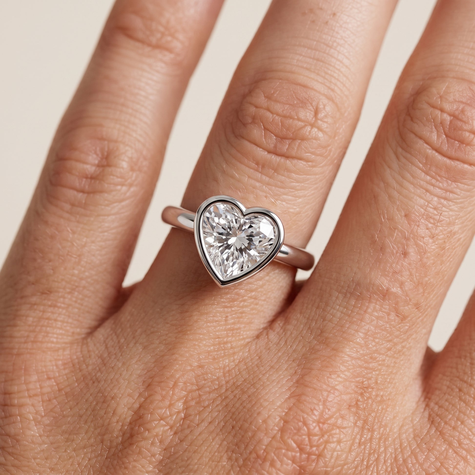 Maeve Bezel Solitaire Heart Diamond Ring in Silver - lifestyle.jpg