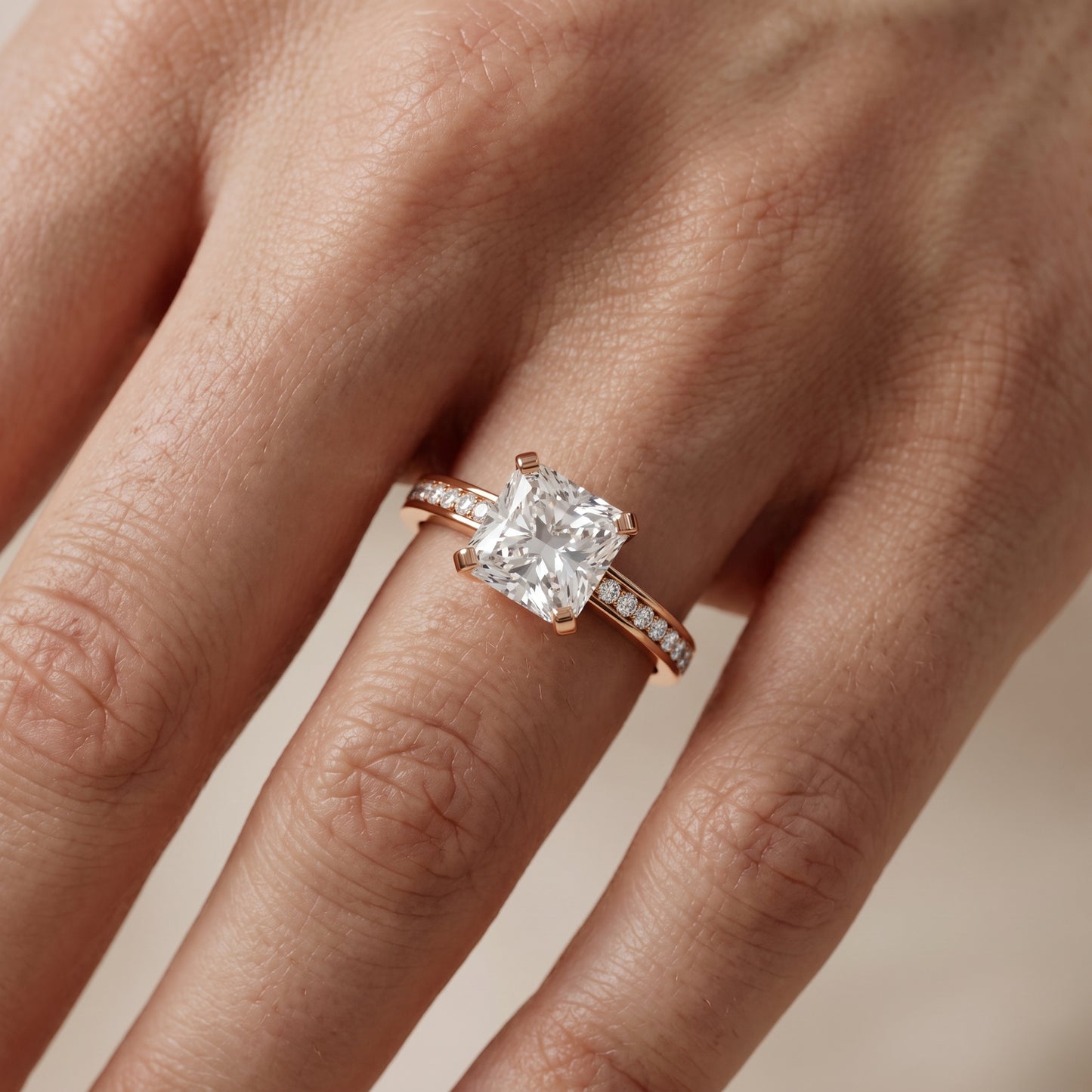 Tessa Solitaire Channel Set Radiant Diamond Engagement Ring in Rose Gold - lifestyle.jpg