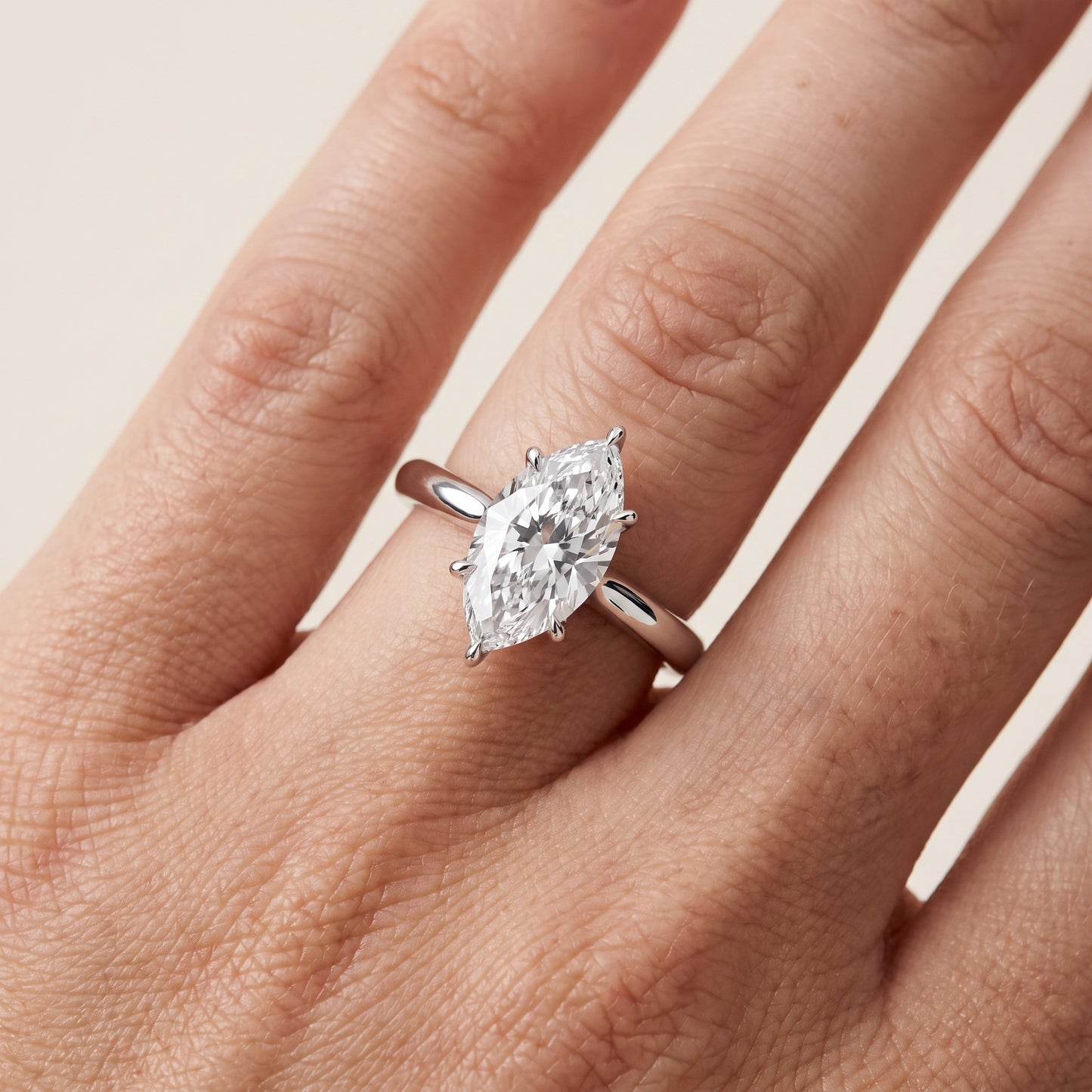 Evie Solitaire Six-Prong Marquise Diamond Engagement Ring in White Gold - lifestyle.jpg