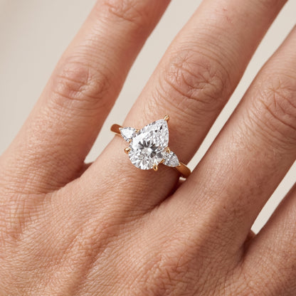 Leila Three-Stone Pear Diamond Engagement Ring in Yellow Gold - lifestyle.jpg