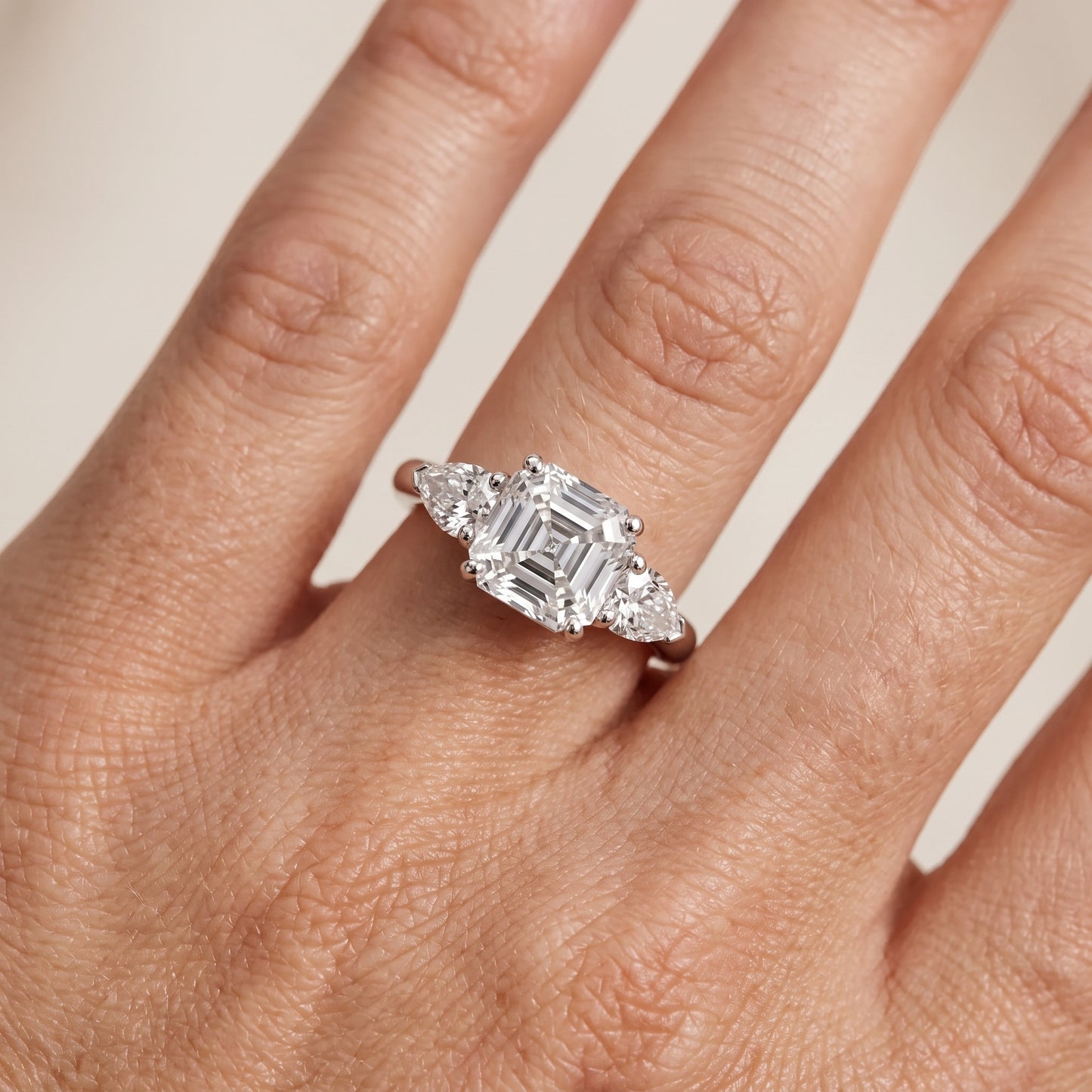 Mirabel Three-Stone Asscher Diamond Engagement Ring in Platinum - lifestyle.jpg