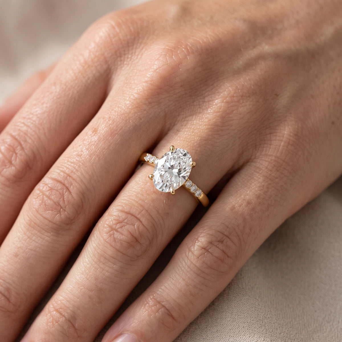 Eugenie Flush-Set Oval Diamond Engagement Ring in Rose Gold - lifestyle.jpg