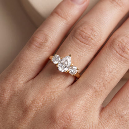 Callie Three-Stone Trellis Pear Diamond Engagement Ring in Yellow Gold - lifestyle.jpg