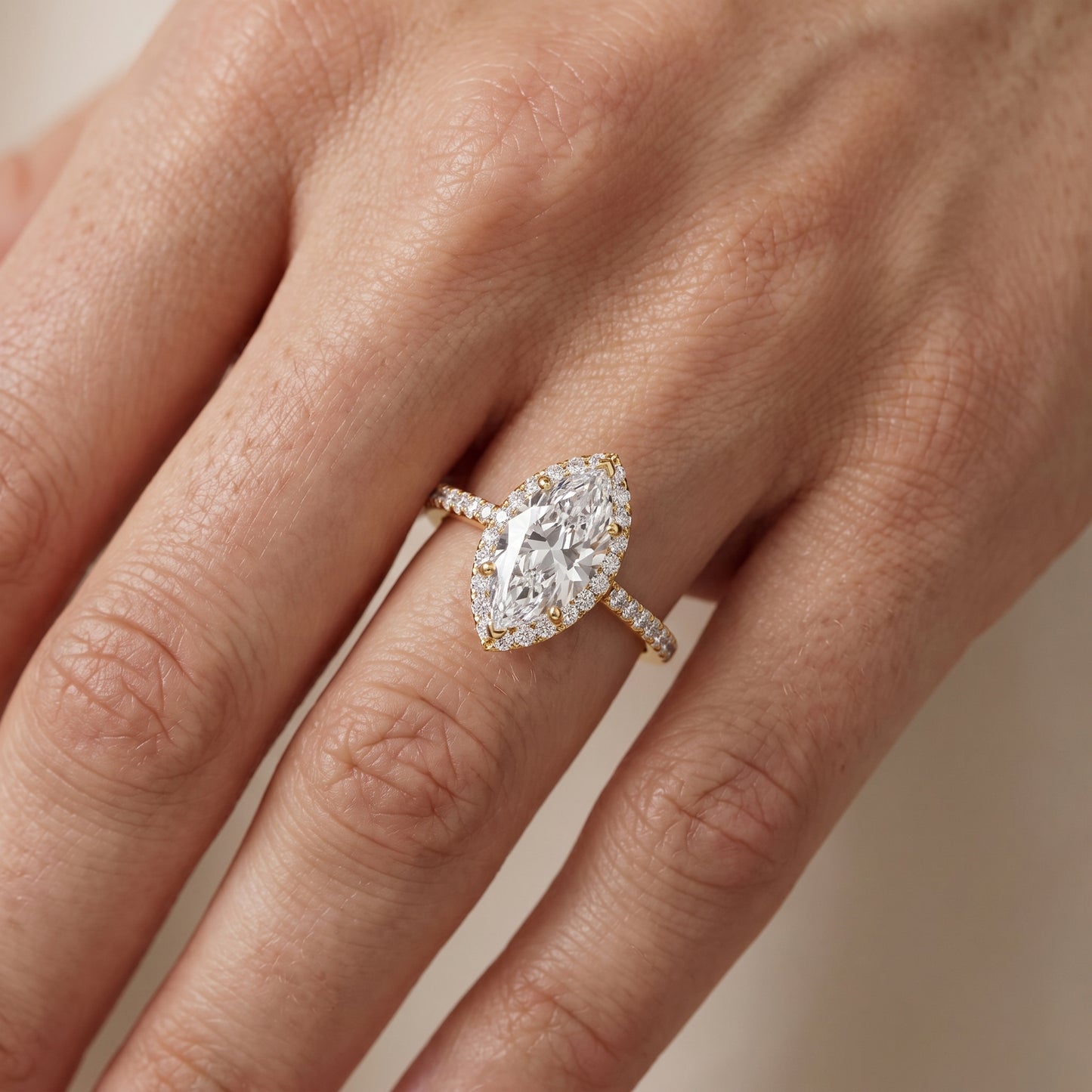 Alma Halo Pavé Marquise Diamond Ring in Yellow Gold - lifestyle.jpg