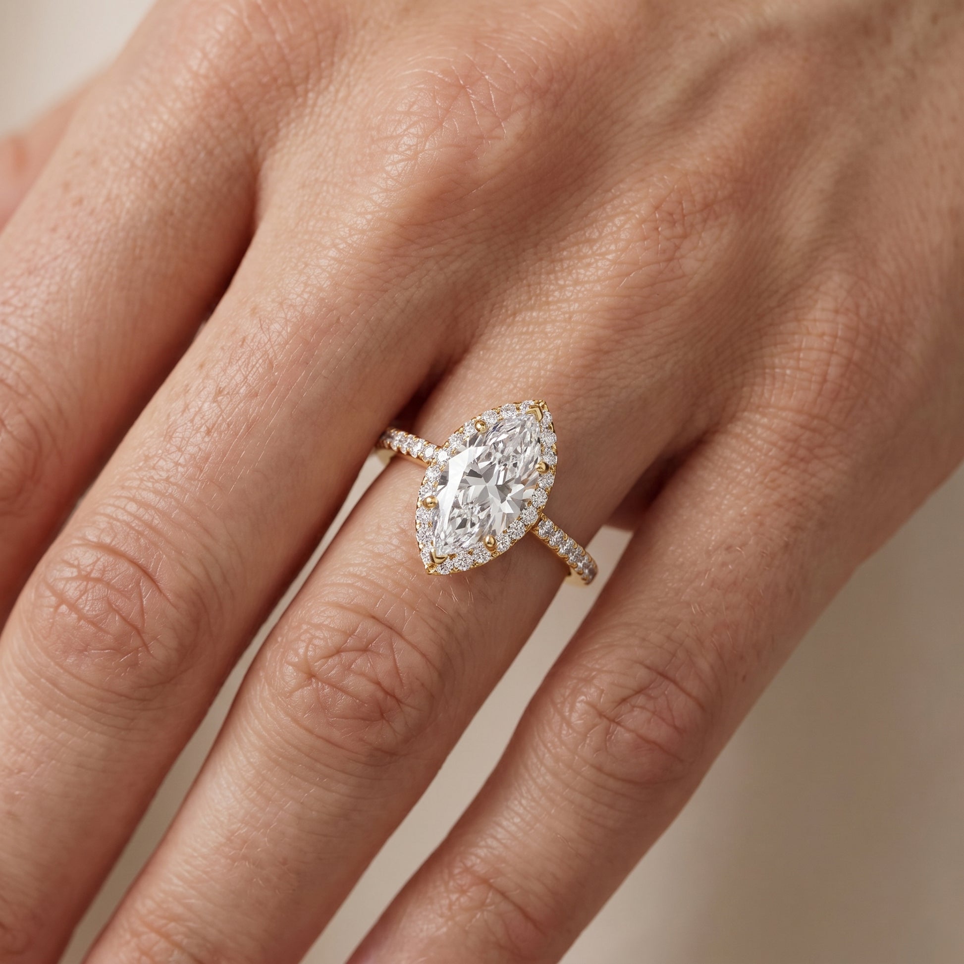 Alma Halo Pavé Marquise Diamond Ring in Yellow Gold - lifestyle.jpg