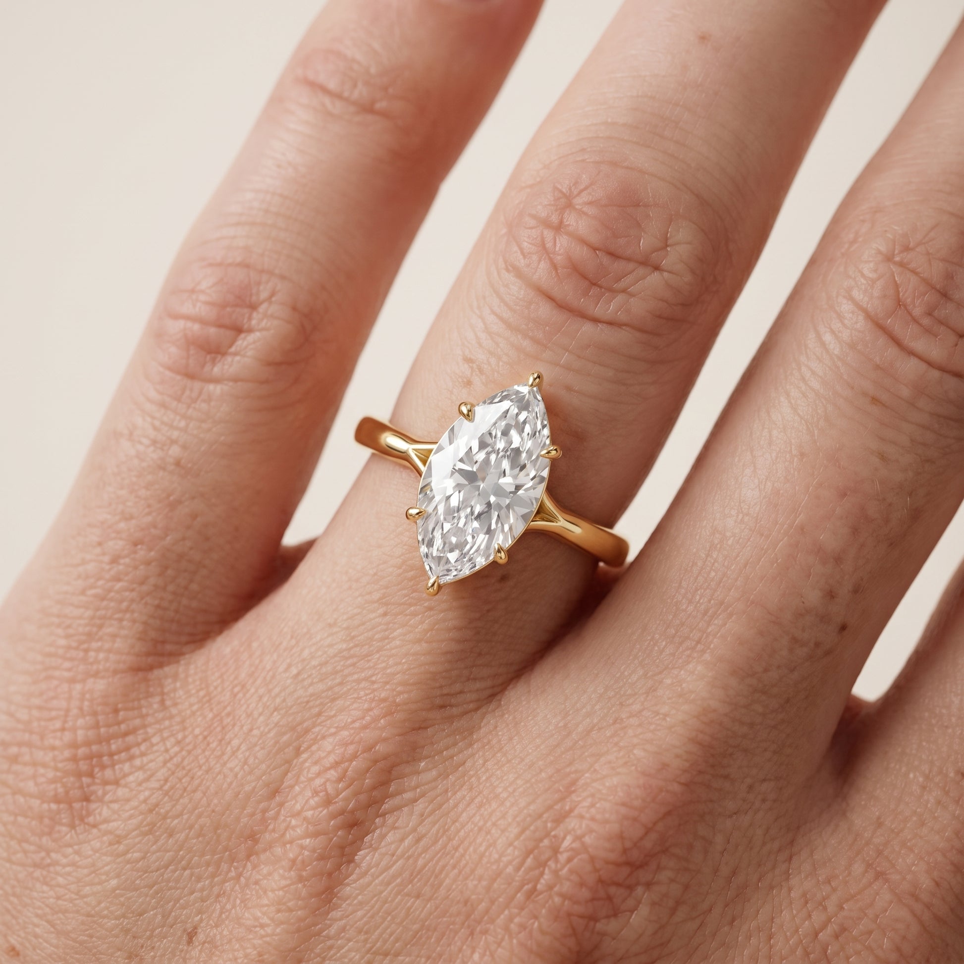 Anais Trellis Solitaire Marquise Diamond Engagement Ring in Yellow Gold - lifestyle.jpg