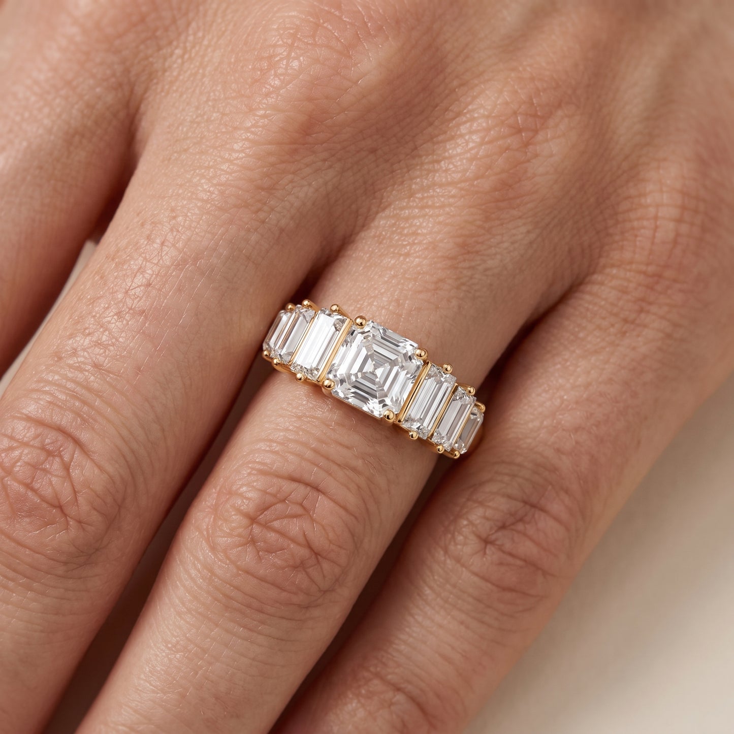 Mara Sidestone Baguette Accent Asscher Diamond Engagement Ring in Yellow Gold - lifestyle.jpg