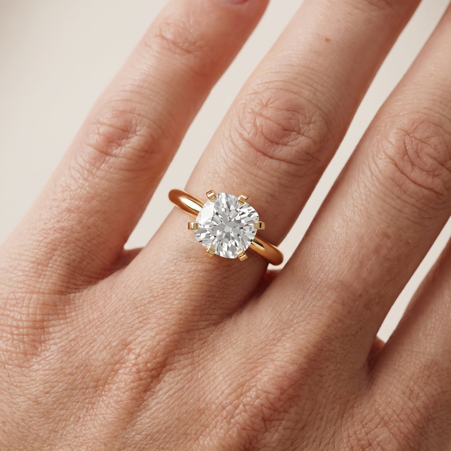 Amira Six-Prong Solitaire Cushion Diamond Engagement Ring in Yellow Gold - lifestyle.jpg