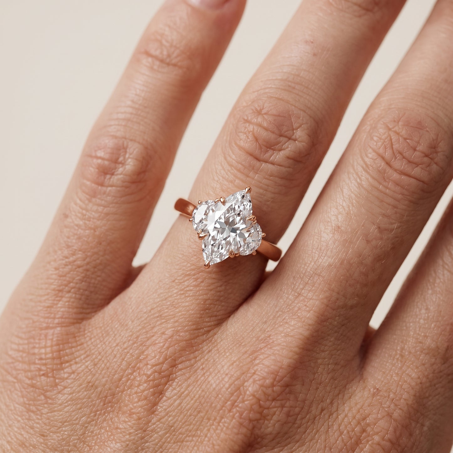 Romy Three-Stone Marquise Diamond Engagement Ring in Rose Gold - lifestyle.jpg