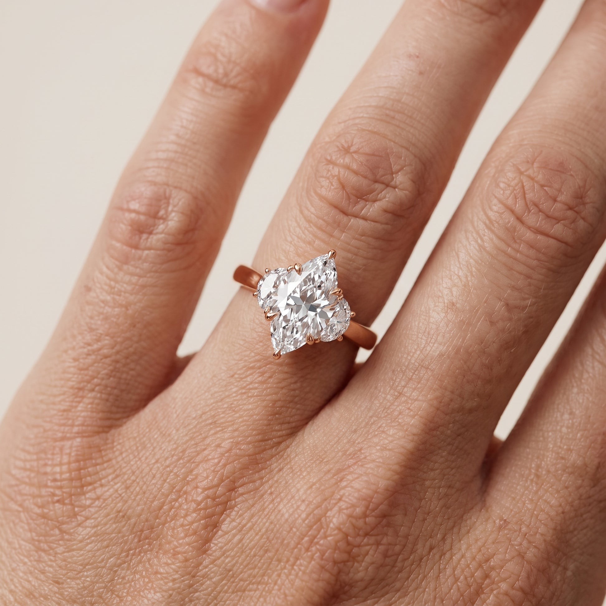 Romy Three-Stone Marquise Diamond Engagement Ring in Rose Gold - lifestyle.jpg