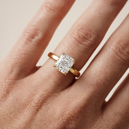 Lara Hidden Halo Radiant Diamond Engagement Ring in Yellow Gold - lifestyle.jpg
