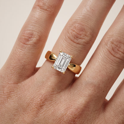 Talia Solitaire Twist Emerald Diamond Engagement Ring in Yellow Gold - lifestyle.jpg