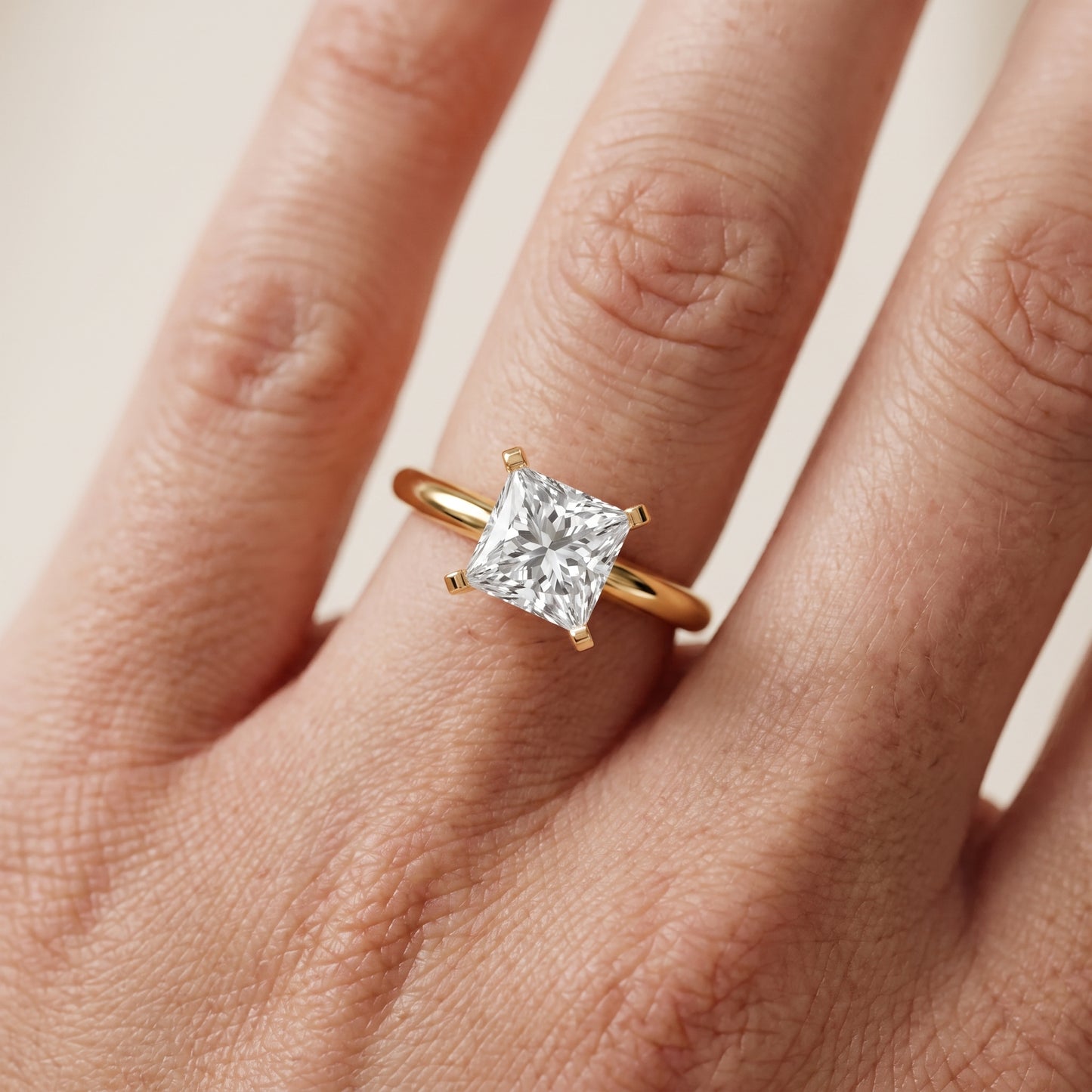 Amira Six-Prong Solitaire Princess Diamond Engagement Ring in Yellow Gold - lifestyle.jpg
