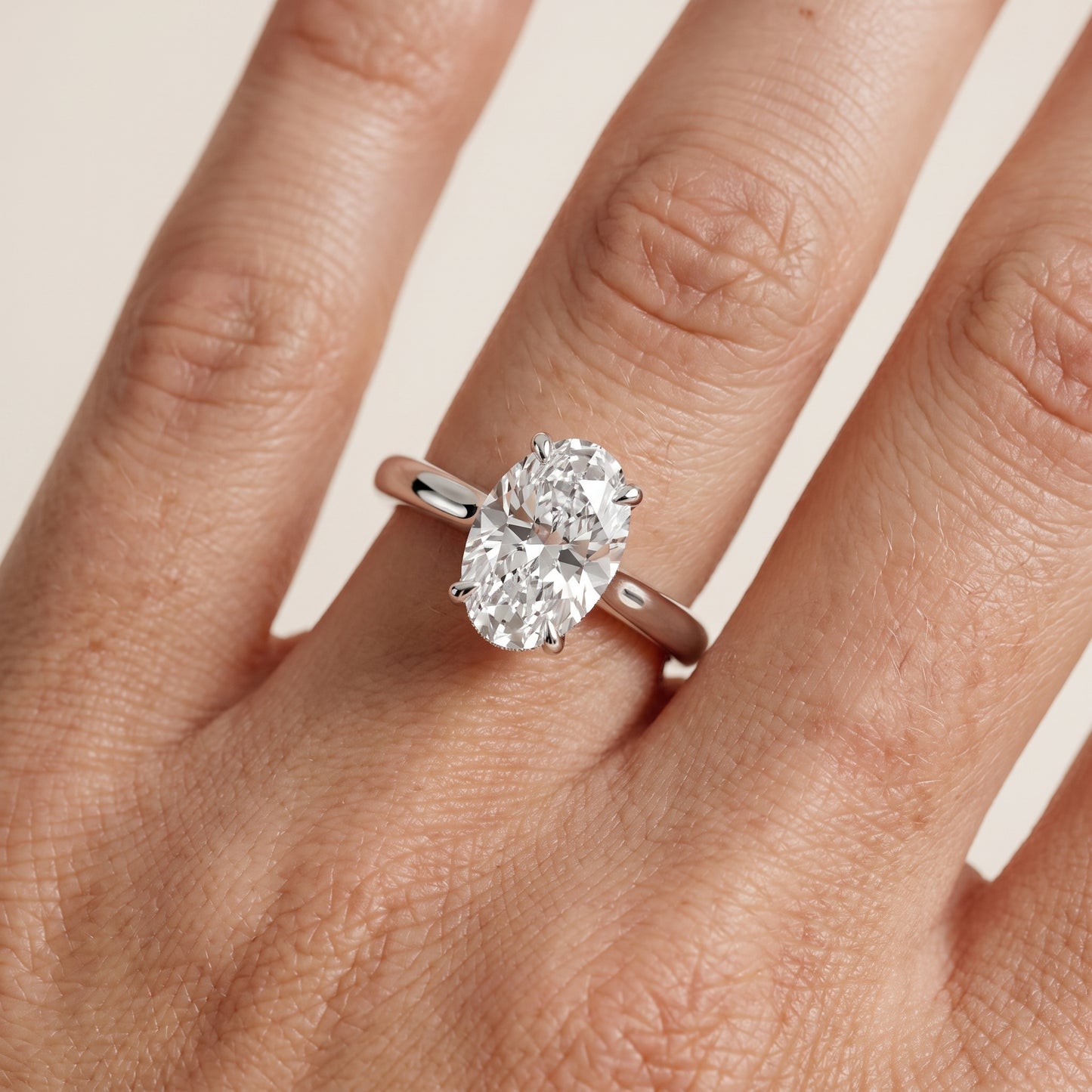 Mena Hidden Halo Oval Diamond Engagement Ring in Platinum - lifestyle.jpg