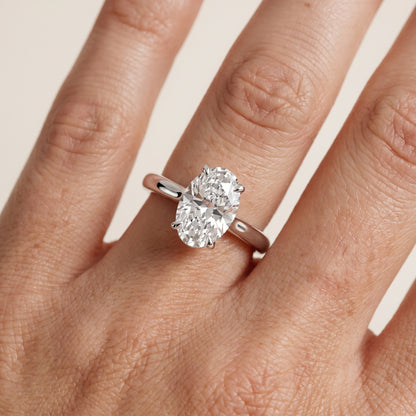 Mena Hidden Halo Oval Diamond Engagement Ring in Platinum - lifestyle.jpg
