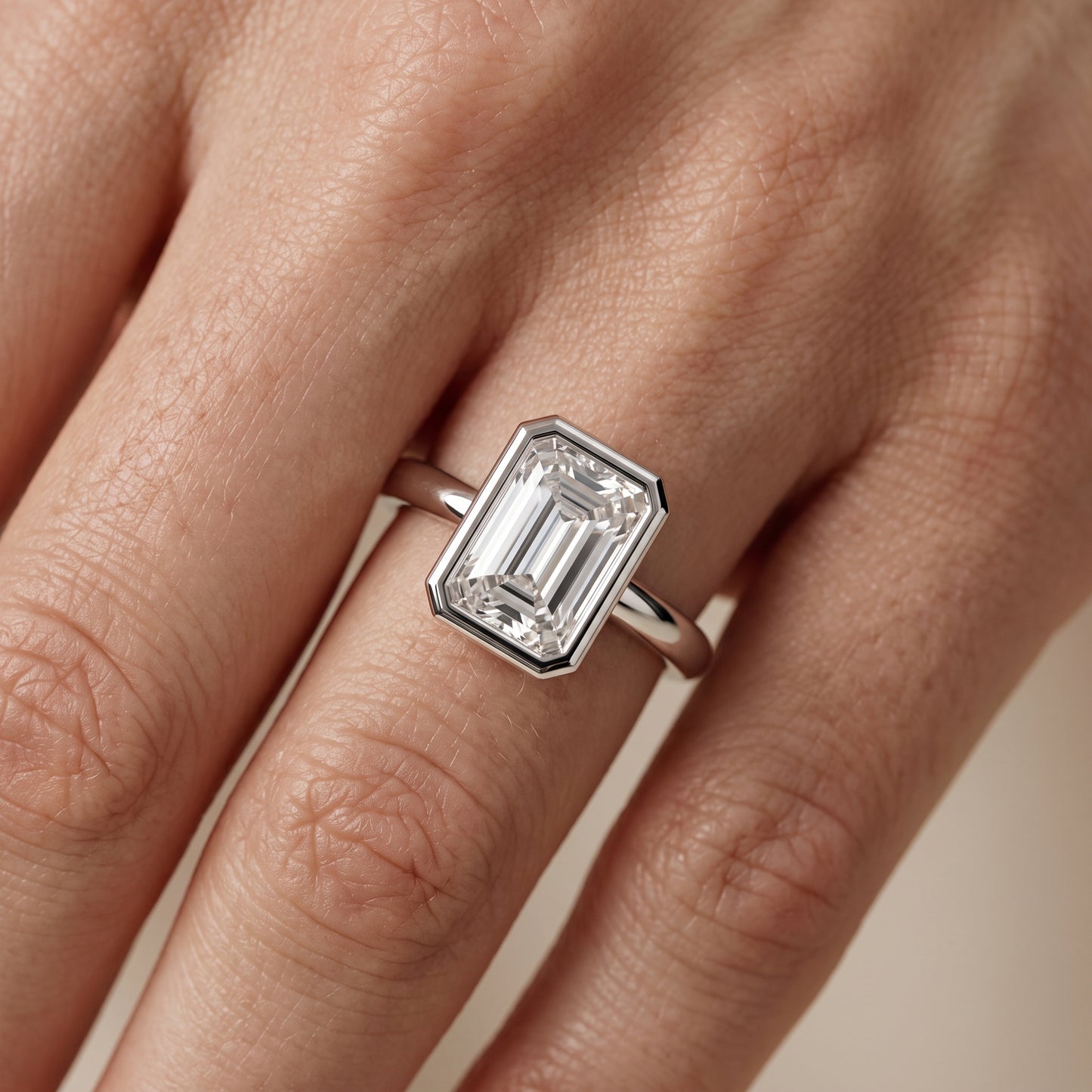 Maeve Bezel Solitaire Emerald Diamond Ring in Silver - lifestyle.jpg