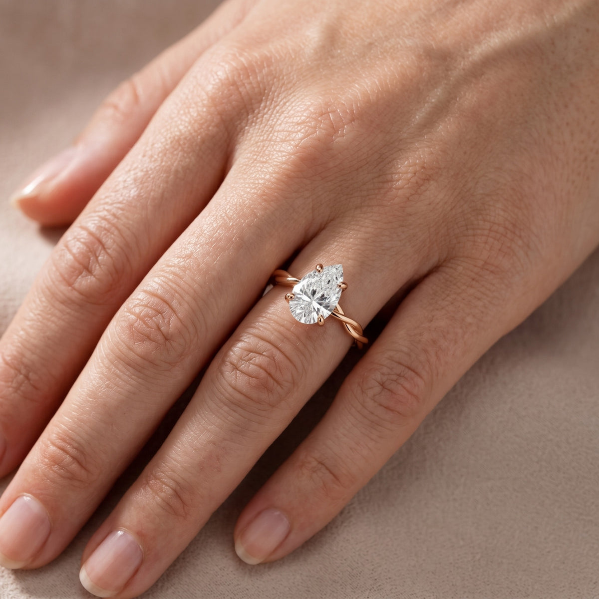 Iris Twist Pear Diamond Engagement Ring in Rose Gold - lifestyle.jpg