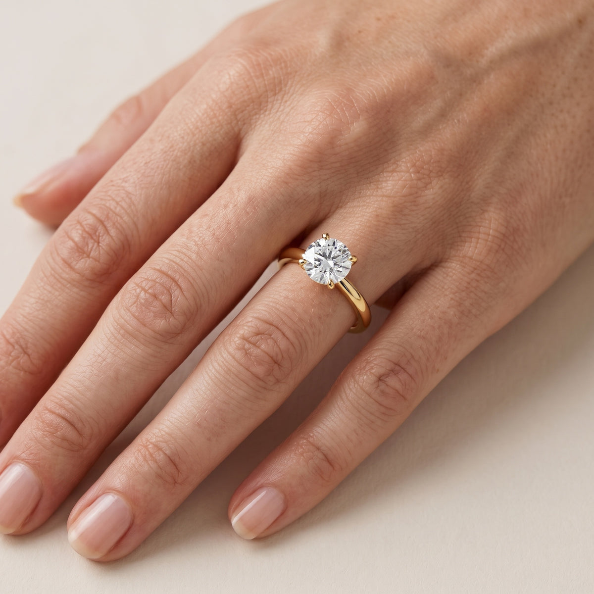 Elspeth Solitaire Round Diamond Engagement Ring in Platinum - lifestyle.jpg