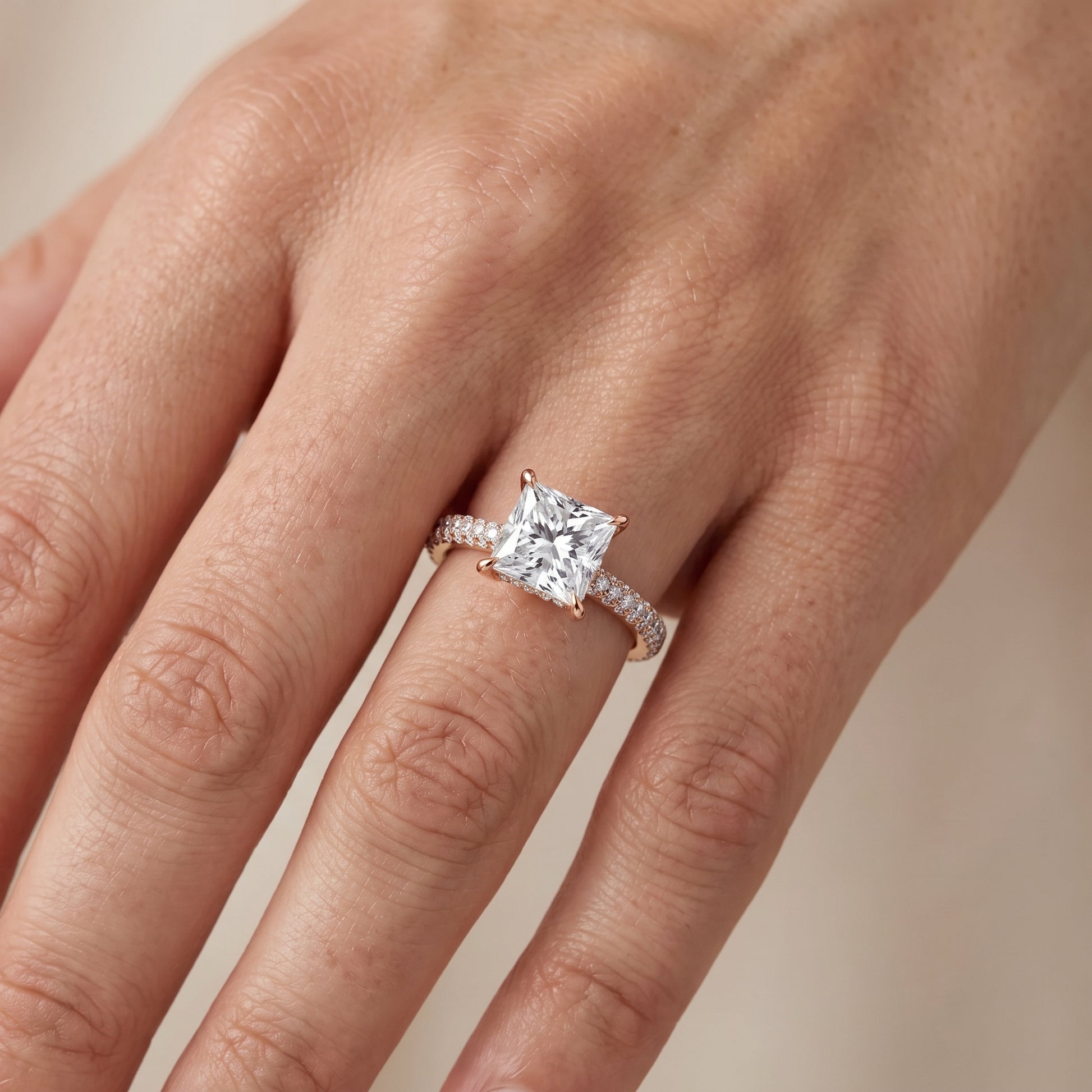 Della Hidden Halo Pavé Princess Diamond Engagement Ring in Rose Gold - lifestyle.jpg
