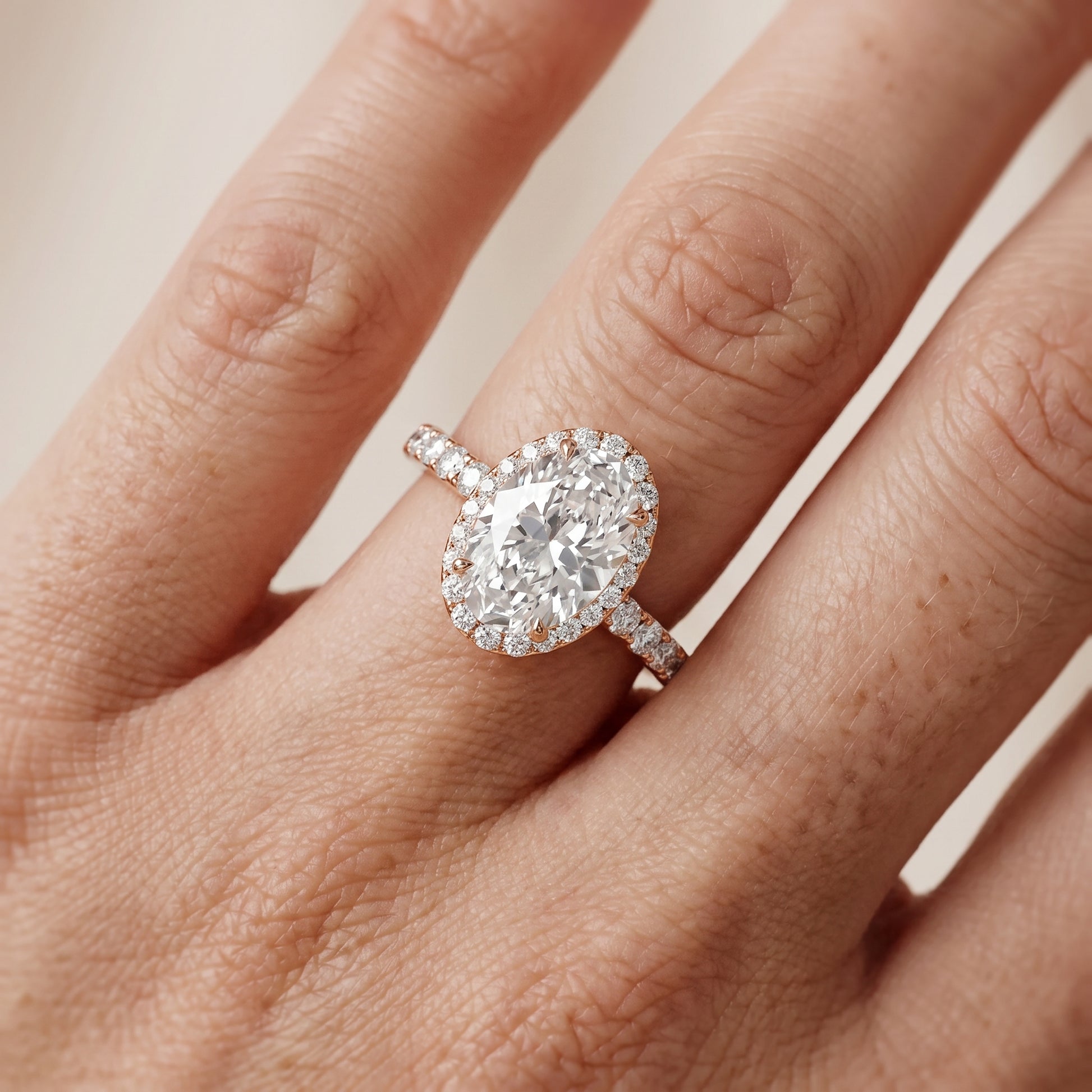 Chloe Halo Pavé Oval Diamond Ring in Rose Gold - lifestyle.jpg