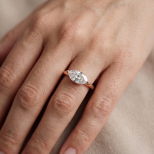Maisie Four Prong Solitaire Marquise Diamond Engagement Ring in Rose Gold - lifestyle.jpg