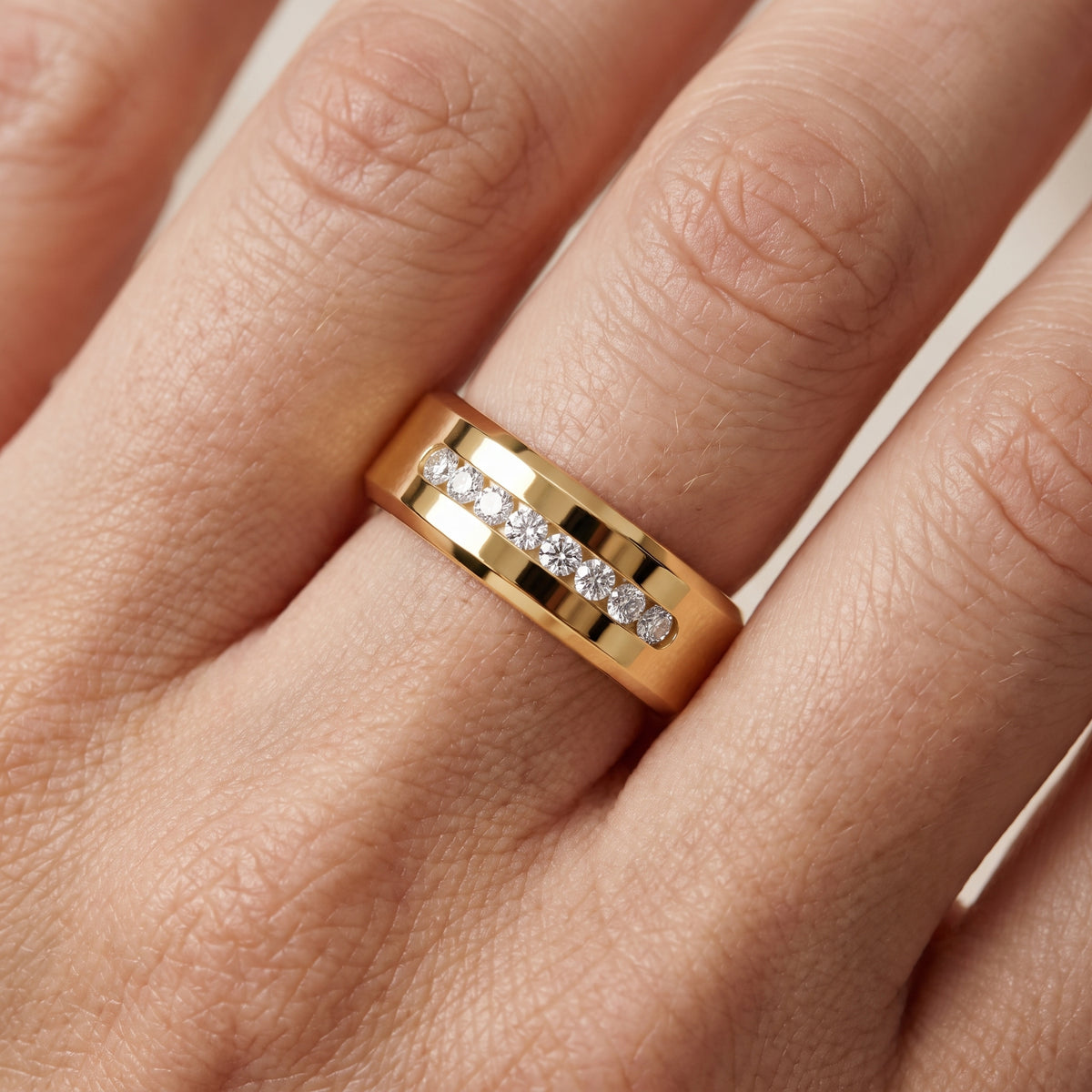Reva Channel Set Round Diamond Wedding Band in Yellow Gold - lifestyle.jpg