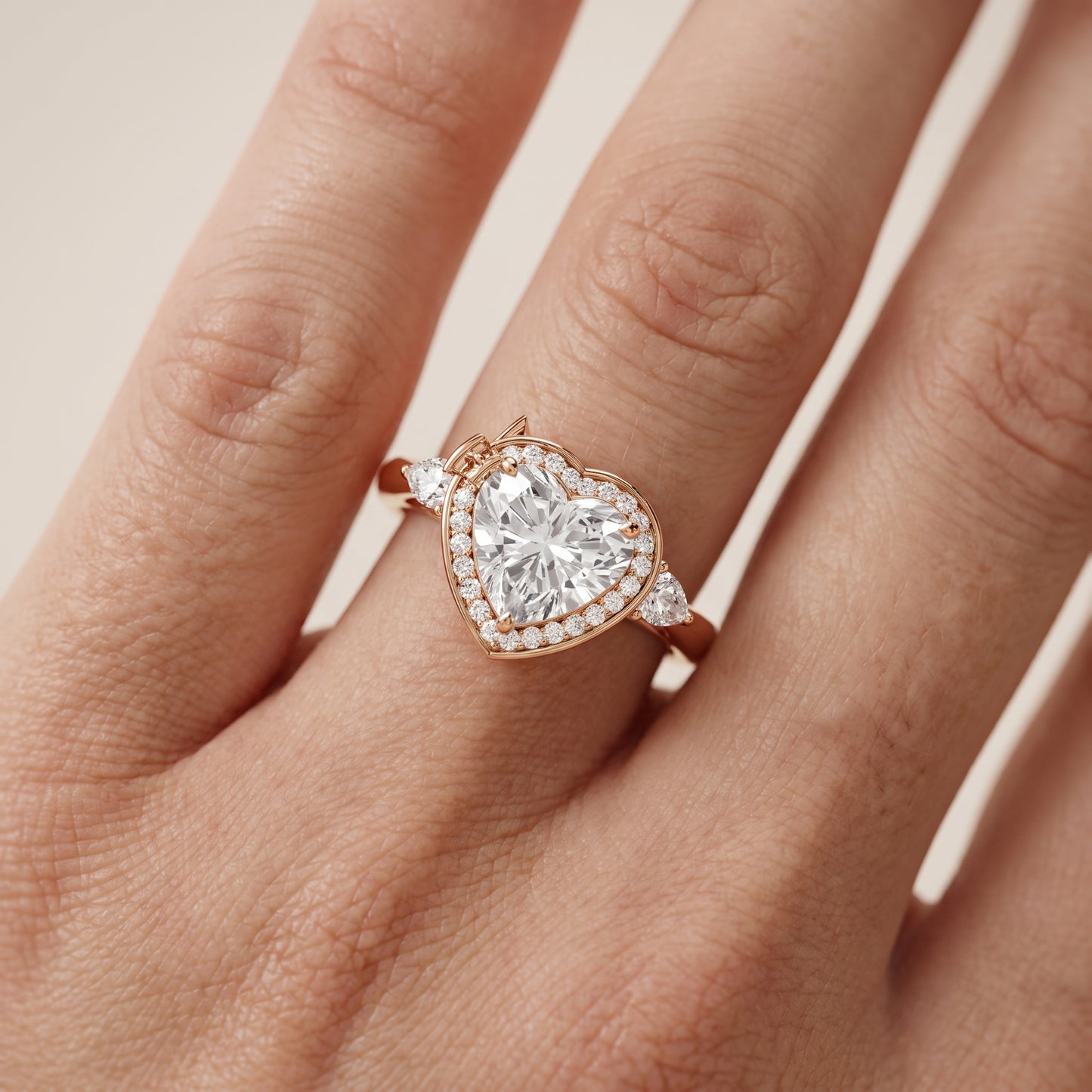 Eliza Halo Sidestone Heart Diamond Engagement Ring in Rose Gold - lifestyle.jpg