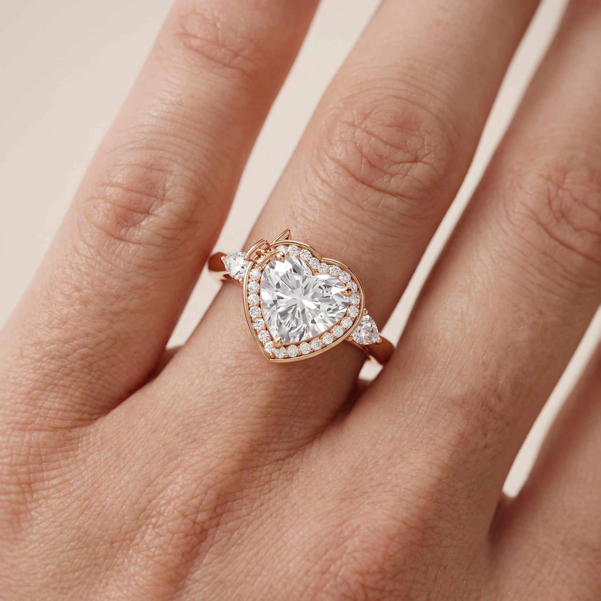 Eliza Halo Sidestone Heart Diamond Engagement Ring in Rose Gold - lifestyle.jpg