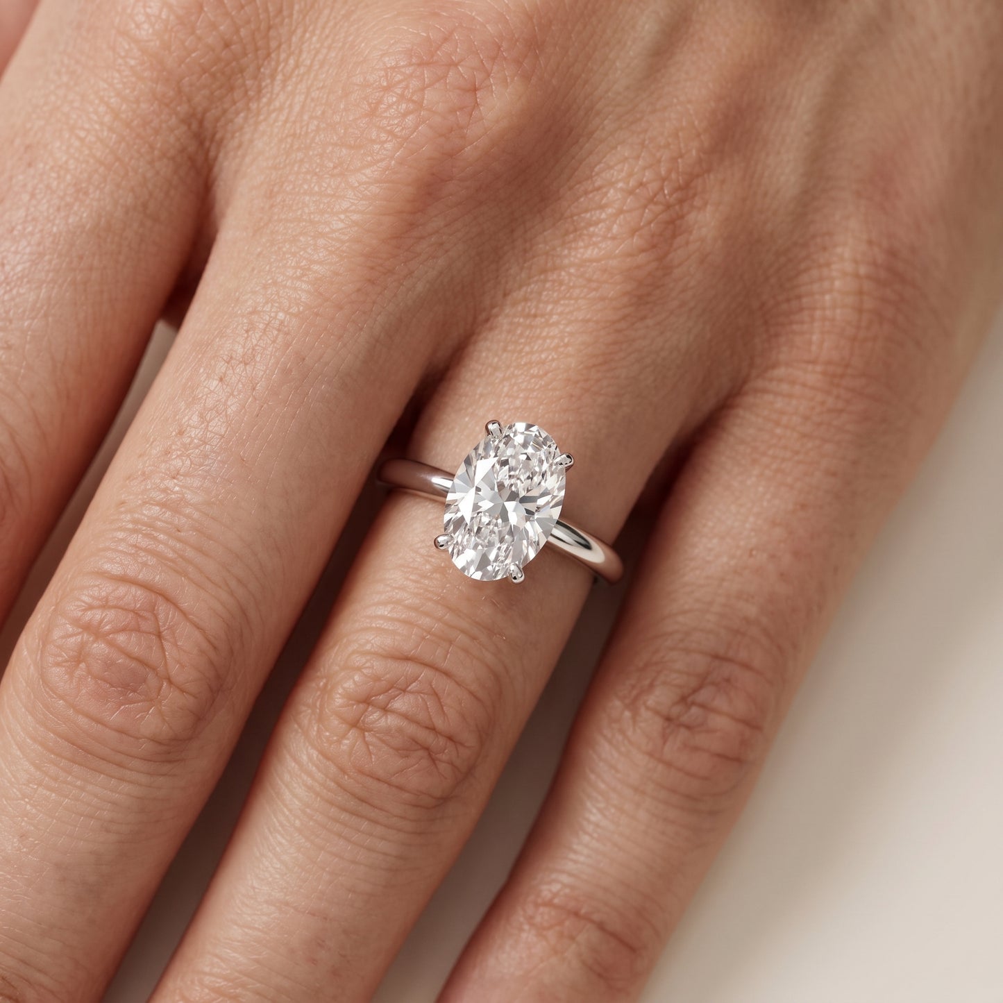 Wren Solitaire Oval Diamond Ring in Silver - lifestyle.jpg