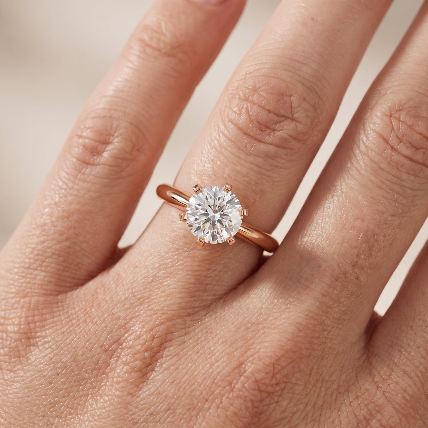 Amira Six-Prong Solitaire Round Diamond Engagement Ring in Rose Gold - lifestyle.jpg