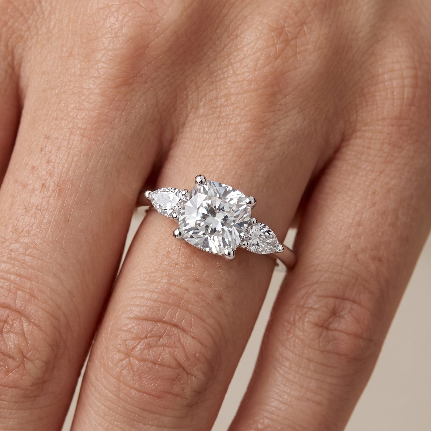 Faye Three-Stone Trellis Cushion Diamond Ring in White Gold - lifestyle.jpg