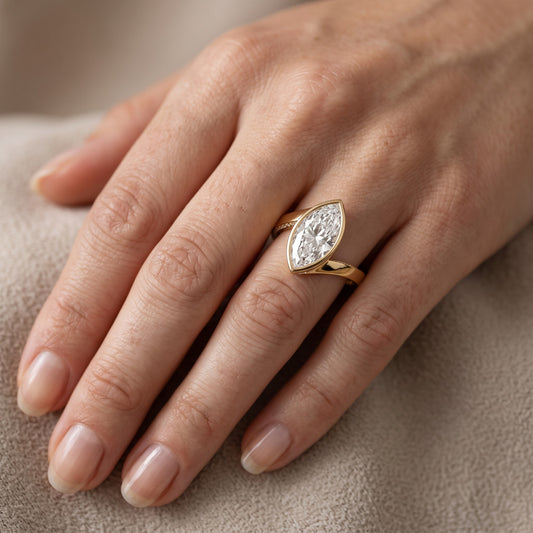Marigold Bezel Bypass Marquise Diamond Engagement Ring in Yellow Gold - lifestyle.jpg