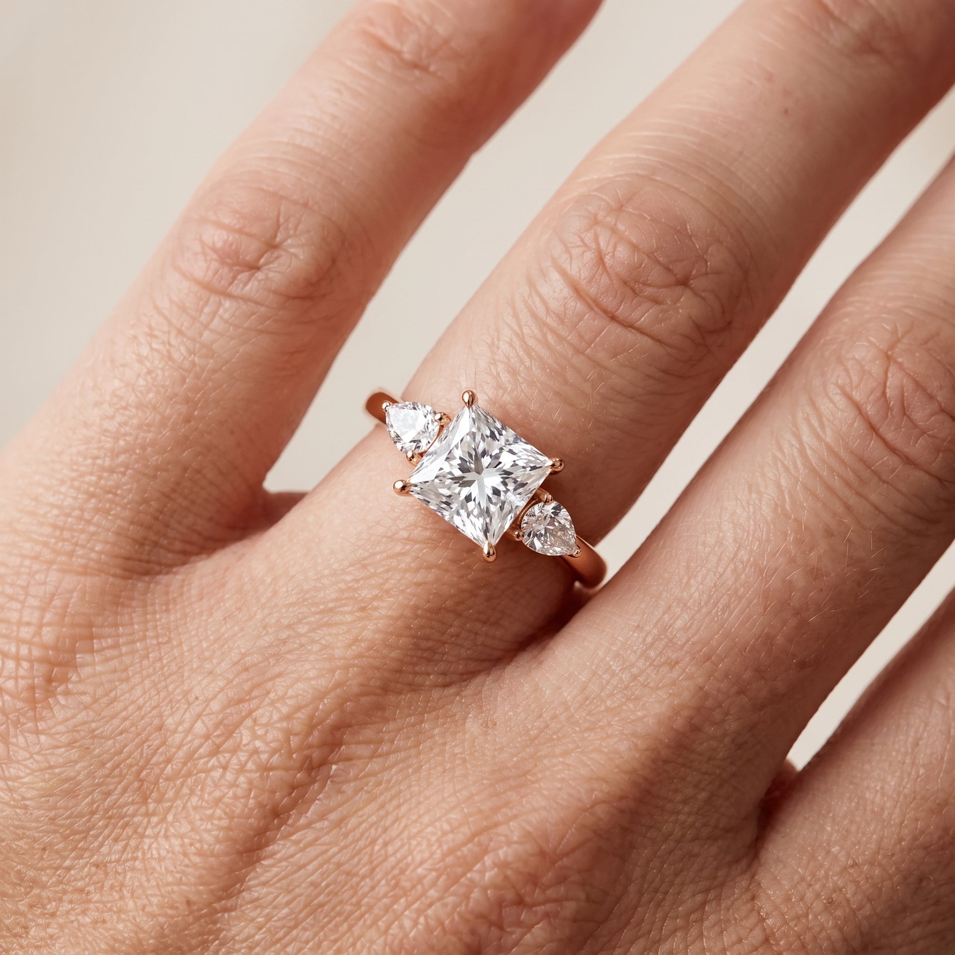 Phoebe Three-Stone Princess Diamond Ring in Rose Gold - lifestyle.jpg
